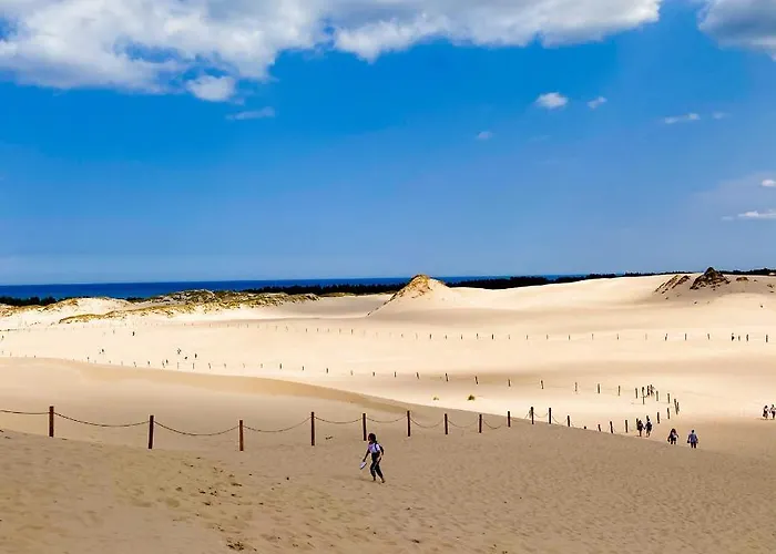 Апартаменты Pod Papugami W Porto Леба