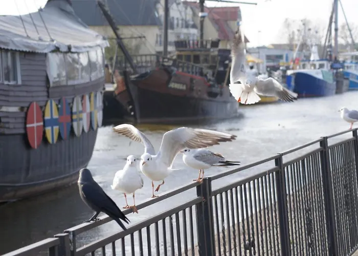 Апартаменты Pod Papugami W Porto Леба